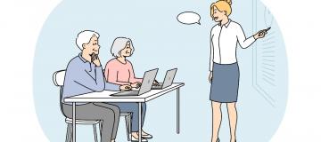 giovane insegnante spiega a persone più anziane di lei